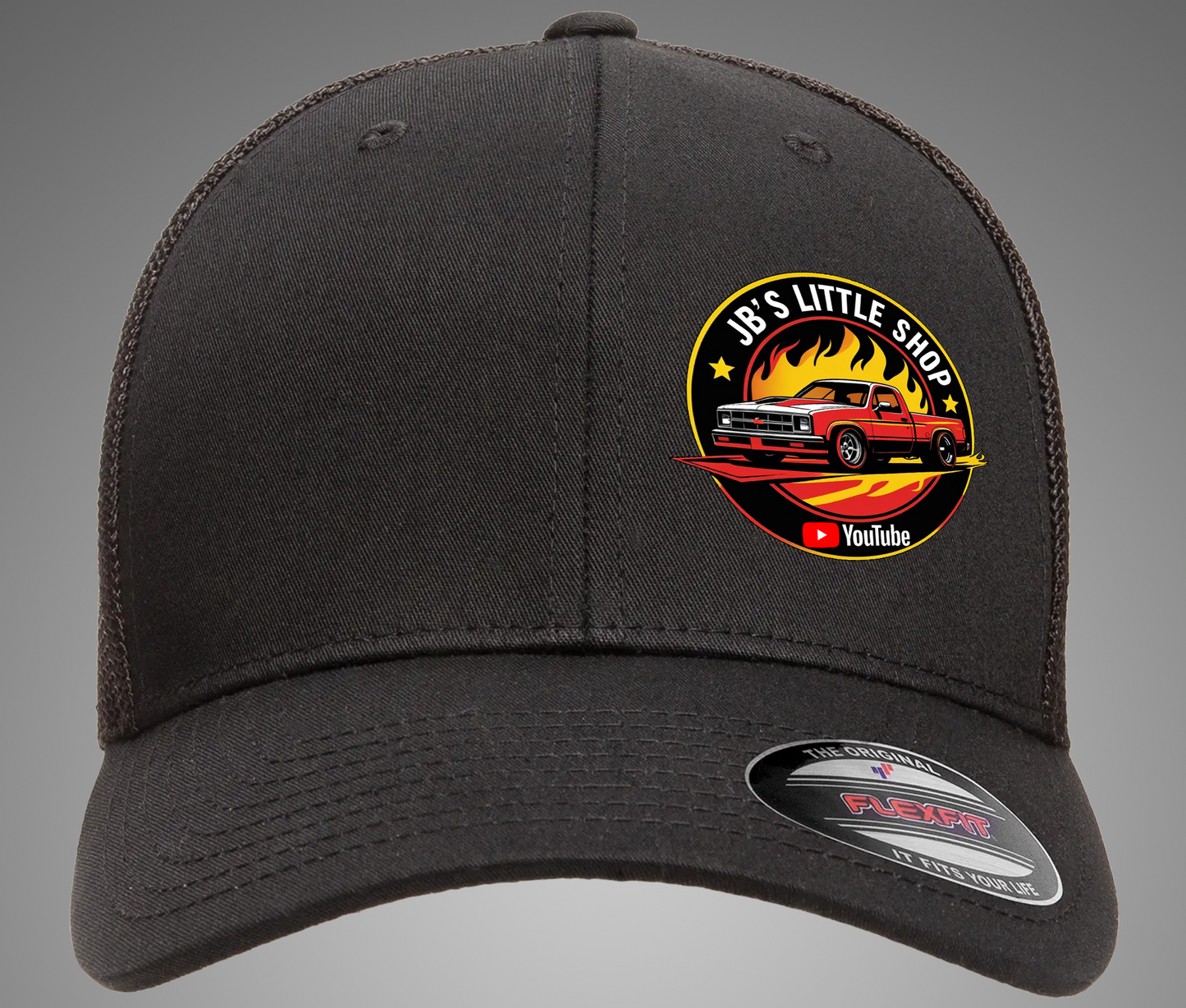 JB's Little Shop Flexfit® Mesh Trucker Cap